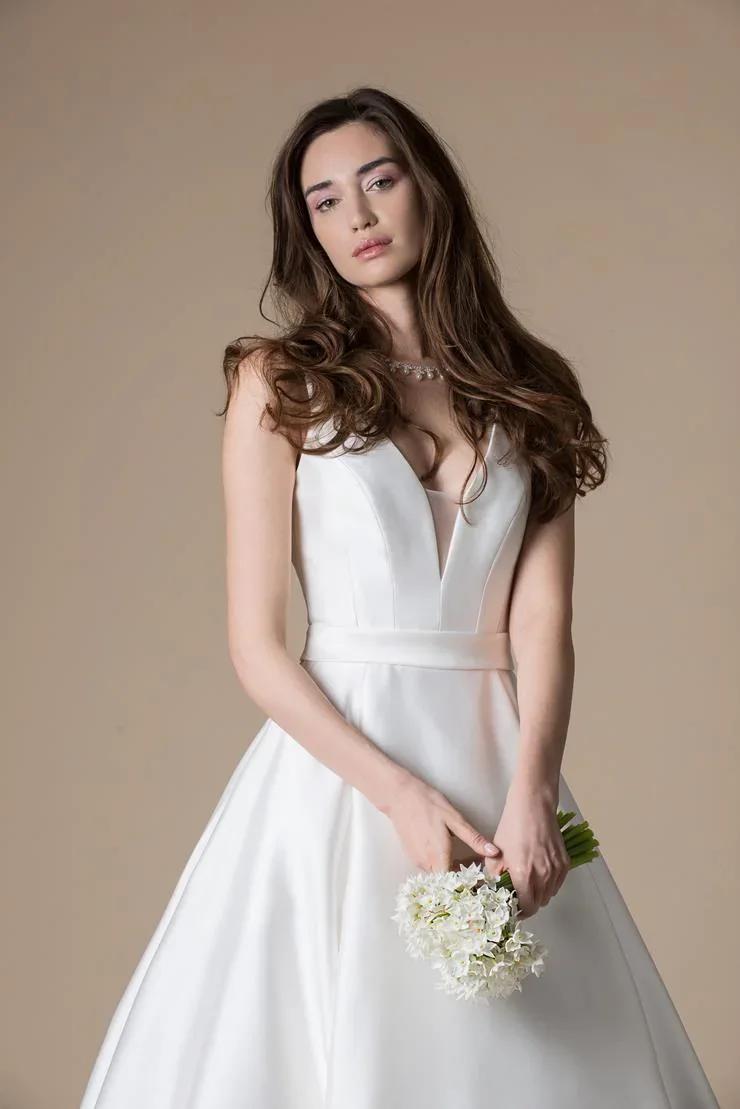 Photo of Model wearing a Alan Hannah Collection White Gown