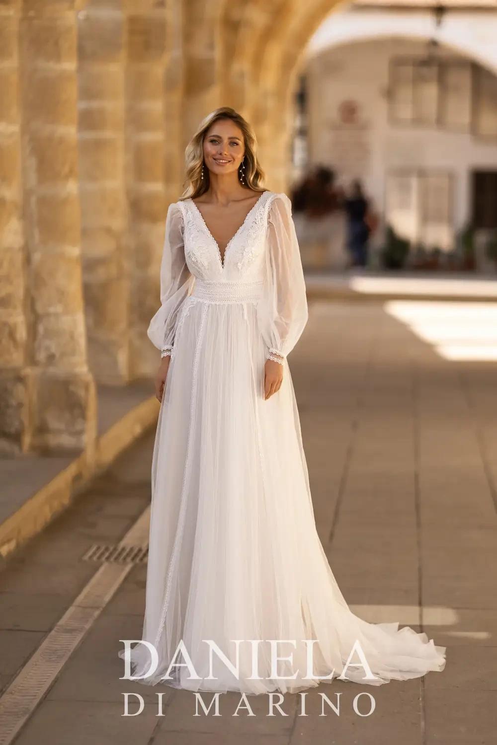 Photo of Model wearing a Daniela Di Marino Collection White Gown